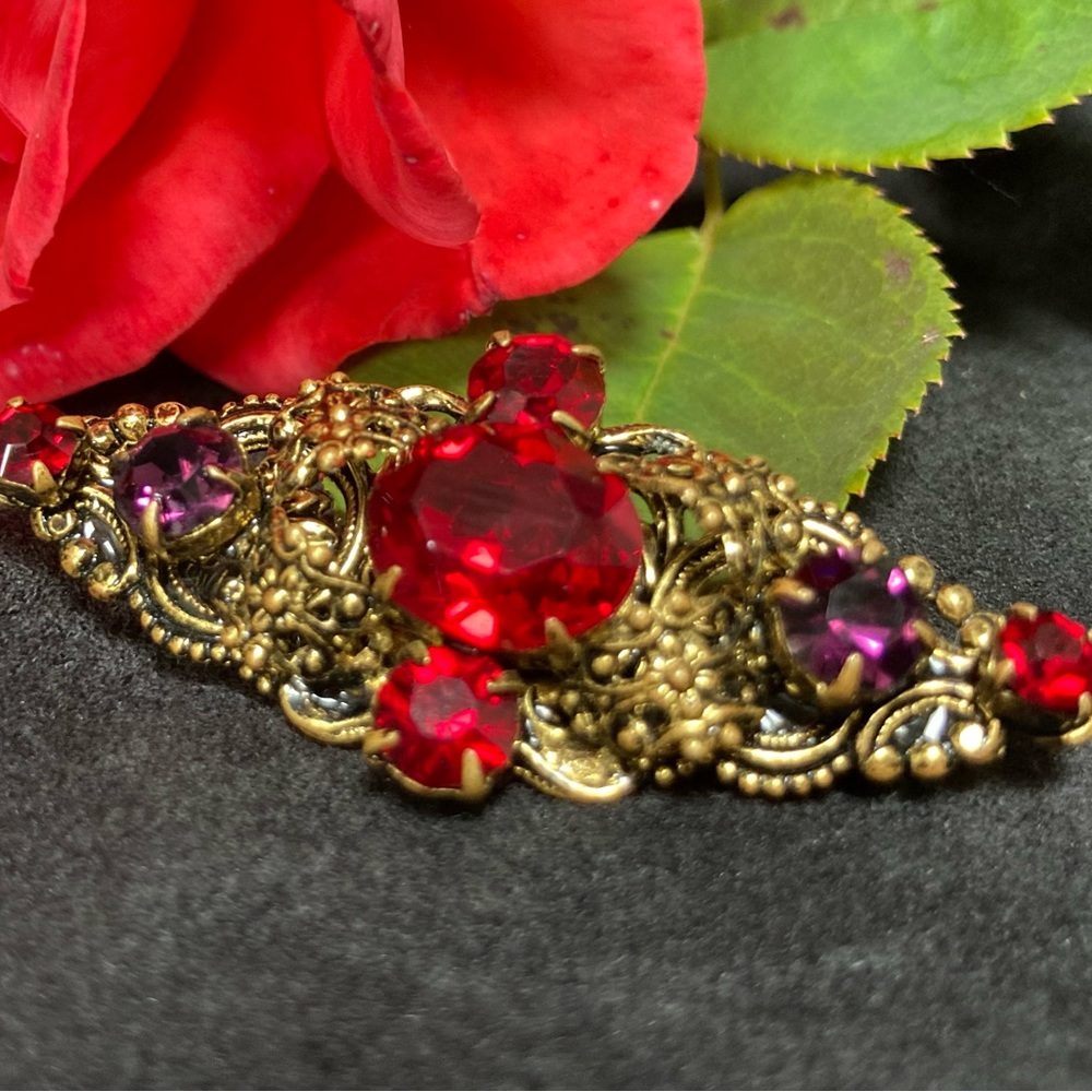 Vintage Czechoslovakian bronze rhinestone brooch pin.